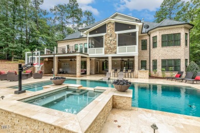 Experience luxury living in this stunning executive home located on MacGregor Downs Country Club in North Carolina - for sale on GolfHomes.com, golf home, golf lot