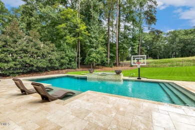 Experience luxury living in this stunning executive home located on MacGregor Downs Country Club in North Carolina - for sale on GolfHomes.com, golf home, golf lot
