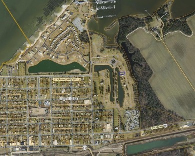 Beautiful pond front building lot located in Cape Charles gated on Bay Creek Golf Club in Virginia - for sale on GolfHomes.com, golf home, golf lot