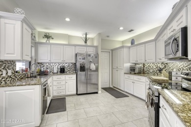 Welcome to your dream home in the prestigious, guard-gated on Spruce Creek Golf Club in Florida - for sale on GolfHomes.com, golf home, golf lot
