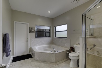 Welcome to your dream home in the prestigious, guard-gated on Spruce Creek Golf Club in Florida - for sale on GolfHomes.com, golf home, golf lot