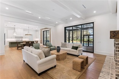 Incredible golf course, lake, and marsh views from one of the on Frederica Golf Club in Georgia - for sale on GolfHomes.com, golf home, golf lot