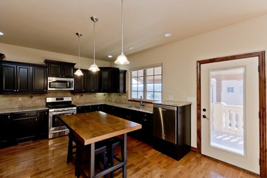 Perched in one of the most scenic settings in the Redlands, this on Tiara Rado Golf Course in Colorado - for sale on GolfHomes.com, golf home, golf lot