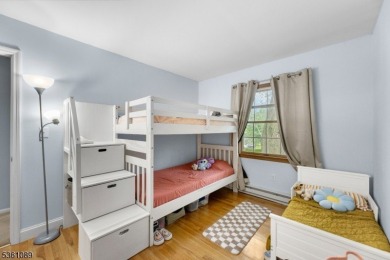 Beautifully maintained 3BR split-level backing to a golf course! on High Bridge Hills Golf Club in New Jersey - for sale on GolfHomes.com, golf home, golf lot