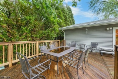 Beautifully maintained 3BR split-level backing to a golf course! on High Bridge Hills Golf Club in New Jersey - for sale on GolfHomes.com, golf home, golf lot
