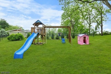 Beautifully maintained 3BR split-level backing to a golf course! on High Bridge Hills Golf Club in New Jersey - for sale on GolfHomes.com, golf home, golf lot