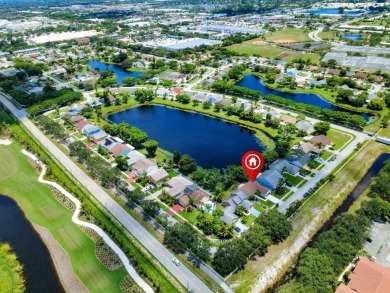Welcome to this centrally located gated community with easy on Leisureville Community Golf Course in Florida - for sale on GolfHomes.com, golf home, golf lot