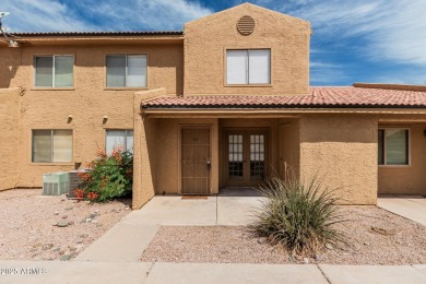 Welcome home to this charming 2-bedroom, 1.5-bath townhome on Raven Golf Club At South Mountain in Arizona - for sale on GolfHomes.com, golf home, golf lot