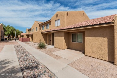 Welcome home to this charming 2-bedroom, 1.5-bath townhome on Raven Golf Club At South Mountain in Arizona - for sale on GolfHomes.com, golf home, golf lot