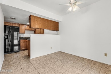 Welcome home to this charming 2-bedroom, 1.5-bath townhome on Raven Golf Club At South Mountain in Arizona - for sale on GolfHomes.com, golf home, golf lot