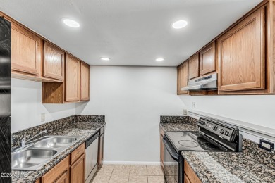 Welcome home to this charming 2-bedroom, 1.5-bath townhome on Raven Golf Club At South Mountain in Arizona - for sale on GolfHomes.com, golf home, golf lot