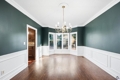 Welcome to 114 Nassau Ct! Tucked away on a quiet cul-de-sac in on Canongate At Healy Point Country Club in Georgia - for sale on GolfHomes.com, golf home, golf lot