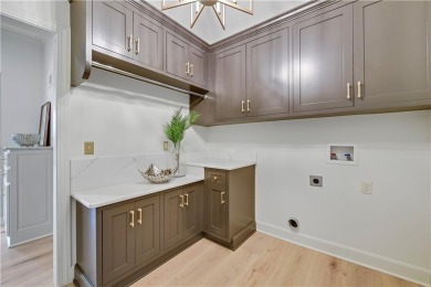 Luxury home is newly updated in the gated community of Loch on Loch Lloyd Country Club in Missouri - for sale on GolfHomes.com, golf home, golf lot