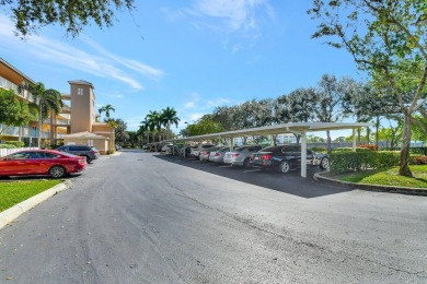 This hard to find TOP FLOOR, CORNER, condo in Coral Lakes (55+) on Westchester Golf and Country Club in Florida - for sale on GolfHomes.com, golf home, golf lot