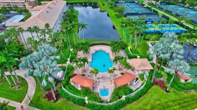This hard to find TOP FLOOR, CORNER, condo in Coral Lakes (55+) on Westchester Golf and Country Club in Florida - for sale on GolfHomes.com, golf home, golf lot