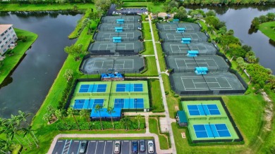 This hard to find TOP FLOOR, CORNER, condo in Coral Lakes (55+) on Westchester Golf and Country Club in Florida - for sale on GolfHomes.com, golf home, golf lot