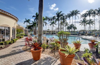 This hard to find TOP FLOOR, CORNER, condo in Coral Lakes (55+) on Westchester Golf and Country Club in Florida - for sale on GolfHomes.com, golf home, golf lot