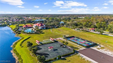 Discover serene lakefront living in the highly sought-after on River Hall Country Club in Florida - for sale on GolfHomes.com, golf home, golf lot