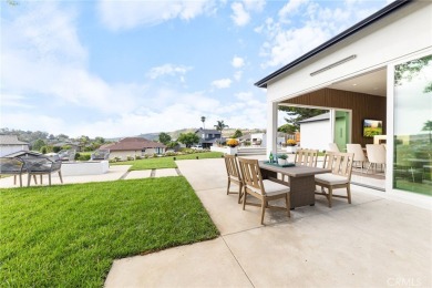 PANORAMIC VIEW, CITY LIGHTS, Golf course & SUNSET. This single on El Niguel Country Club in California - for sale on GolfHomes.com, golf home, golf lot