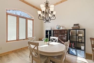 Poised beneath a canopy of mature trees on a gorgeous one-acre on Sugar Tree Golf and Country Club in Texas - for sale on GolfHomes.com, golf home, golf lot