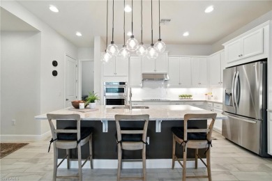 Modern, move-in ready, and effortlessly fresh--this North Naples on Vanderbilt Country Club in Florida - for sale on GolfHomes.com, golf home, golf lot