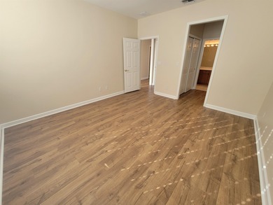 Welcome to this freshly updated 3-bedroom, 2.5-bath home located on Southwood Golf Club in Florida - for sale on GolfHomes.com, golf home, golf lot