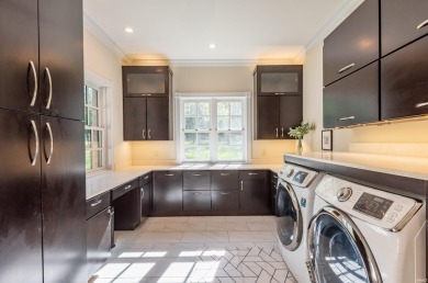 This exceptional luxury residence blends timeless elegance and on The Eagle Pointe Golf Resort in Indiana - for sale on GolfHomes.com, golf home, golf lot
