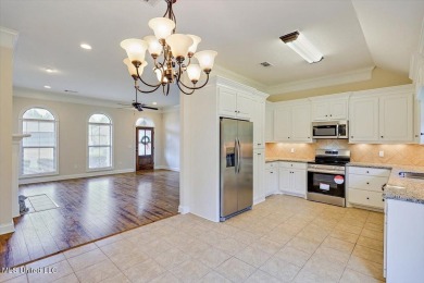 Discover this inviting 3-bedroom, 2-bathroom split-plan home in on Patrick Farms Golf Club in Mississippi - for sale on GolfHomes.com, golf home, golf lot