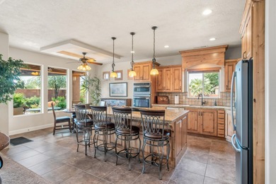 VIEWS from every window! This beautiful 3 bed + den Green Spring on Green Spring Country Club in Utah - for sale on GolfHomes.com, golf home, golf lot