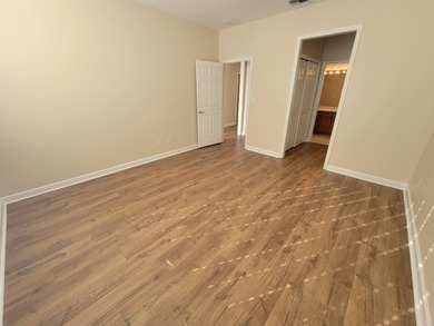 Welcome to this freshly updated 3-bedroom, 2.5-bath home located on Southwood Golf Club in Florida - for sale on GolfHomes.com, golf home, golf lot