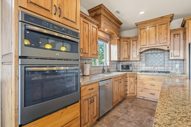 VIEWS from every window! This beautiful 3 bed + den Green Spring on Green Spring Country Club in Utah - for sale on GolfHomes.com, golf home, golf lot