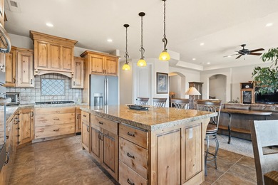 VIEWS from every window! This beautiful 3 bed + den Green Spring on Green Spring Country Club in Utah - for sale on GolfHomes.com, golf home, golf lot