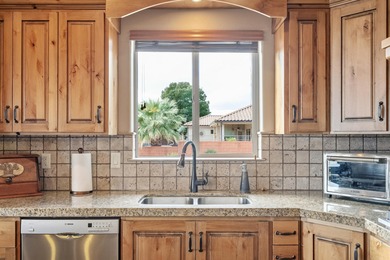 VIEWS from every window! This beautiful 3 bed + den Green Spring on Green Spring Country Club in Utah - for sale on GolfHomes.com, golf home, golf lot