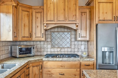 VIEWS from every window! This beautiful 3 bed + den Green Spring on Green Spring Country Club in Utah - for sale on GolfHomes.com, golf home, golf lot