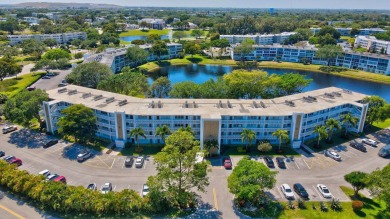 Step into this beautifully furnished 1-bedroom, 1.5-bathroom on Hillsboro Pines Golf in Florida - for sale on GolfHomes.com, golf home, golf lot