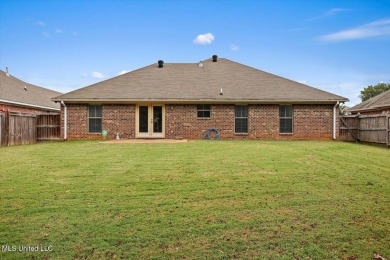 Discover this inviting 3-bedroom, 2-bathroom split-plan home in on Patrick Farms Golf Club in Mississippi - for sale on GolfHomes.com, golf home, golf lot