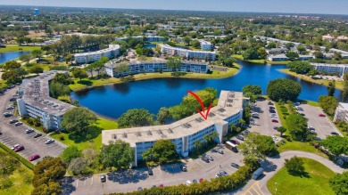 Step into this beautifully furnished 1-bedroom, 1.5-bathroom on Hillsboro Pines Golf in Florida - for sale on GolfHomes.com, golf home, golf lot