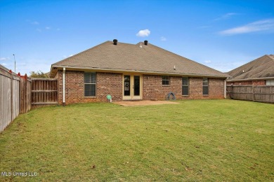 Discover this inviting 3-bedroom, 2-bathroom split-plan home in on Patrick Farms Golf Club in Mississippi - for sale on GolfHomes.com, golf home, golf lot