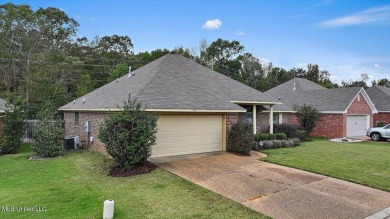 Discover this inviting 3-bedroom, 2-bathroom split-plan home in on Patrick Farms Golf Club in Mississippi - for sale on GolfHomes.com, golf home, golf lot