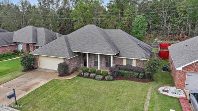 Discover this inviting 3-bedroom, 2-bathroom split-plan home in on Patrick Farms Golf Club in Mississippi - for sale on GolfHomes.com, golf home, golf lot