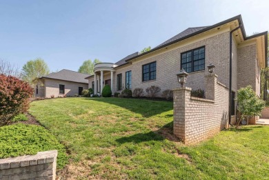 This exceptional luxury residence blends timeless elegance and on The Eagle Pointe Golf Resort in Indiana - for sale on GolfHomes.com, golf home, golf lot