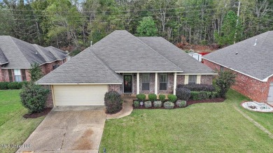 Discover this inviting 3-bedroom, 2-bathroom split-plan home in on Patrick Farms Golf Club in Mississippi - for sale on GolfHomes.com, golf home, golf lot