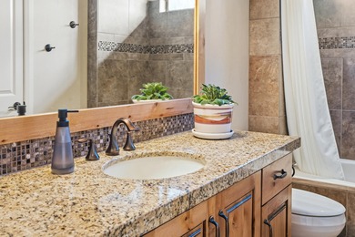 VIEWS from every window! This beautiful 3 bed + den Green Spring on Green Spring Country Club in Utah - for sale on GolfHomes.com, golf home, golf lot