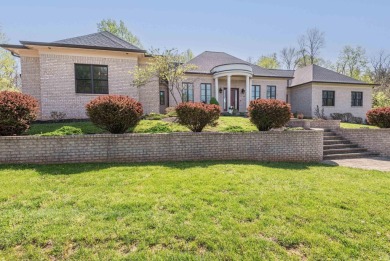 This exceptional luxury residence blends timeless elegance and on The Eagle Pointe Golf Resort in Indiana - for sale on GolfHomes.com, golf home, golf lot