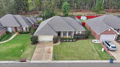 Discover this inviting 3-bedroom, 2-bathroom split-plan home in on Patrick Farms Golf Club in Mississippi - for sale on GolfHomes.com, golf home, golf lot