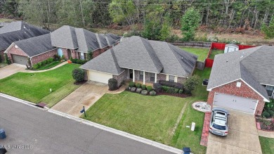 Discover this inviting 3-bedroom, 2-bathroom split-plan home in on Patrick Farms Golf Club in Mississippi - for sale on GolfHomes.com, golf home, golf lot