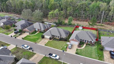 Discover this inviting 3-bedroom, 2-bathroom split-plan home in on Patrick Farms Golf Club in Mississippi - for sale on GolfHomes.com, golf home, golf lot