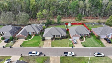 Discover this inviting 3-bedroom, 2-bathroom split-plan home in on Patrick Farms Golf Club in Mississippi - for sale on GolfHomes.com, golf home, golf lot