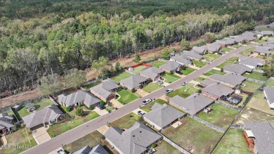 Discover this inviting 3-bedroom, 2-bathroom split-plan home in on Patrick Farms Golf Club in Mississippi - for sale on GolfHomes.com, golf home, golf lot