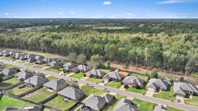 Discover this inviting 3-bedroom, 2-bathroom split-plan home in on Patrick Farms Golf Club in Mississippi - for sale on GolfHomes.com, golf home, golf lot